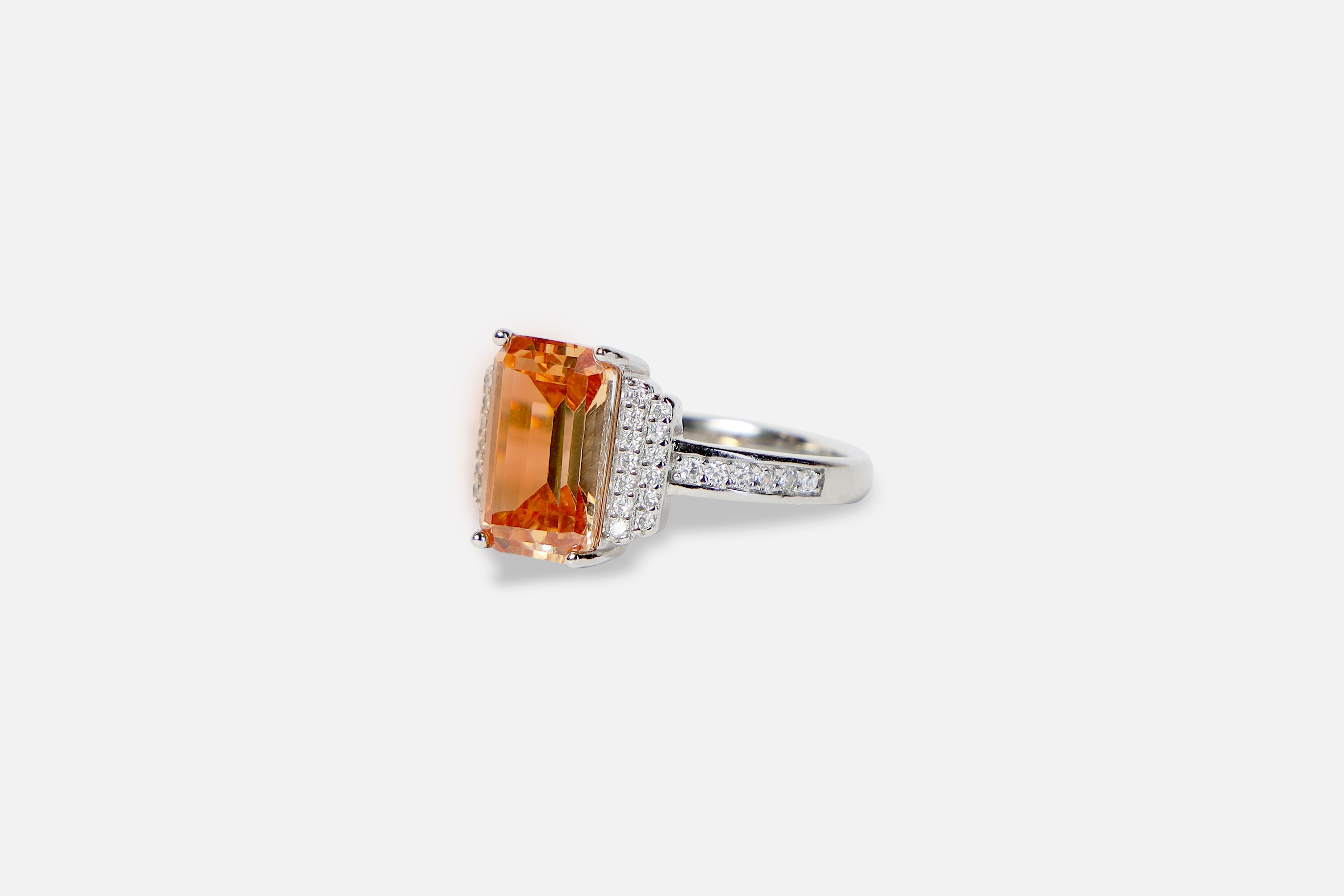 Lustrous Halo Orange Diamond Ring