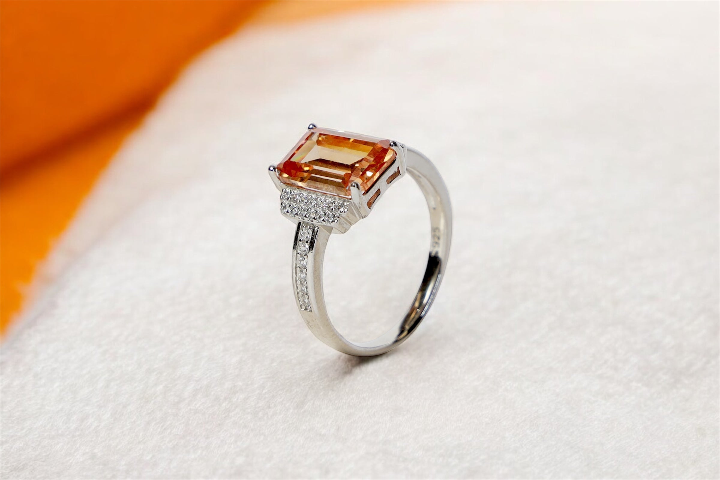Lustrous Halo Orange Diamond Ring